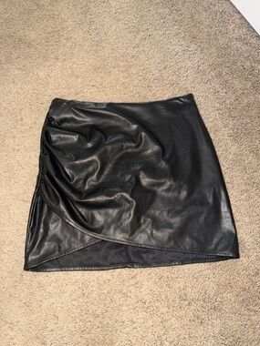 Black leather mini skirt